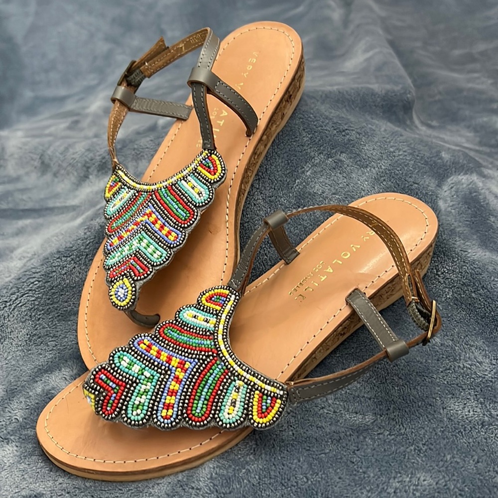 Size 7, beaded slip on beaded sandals.
